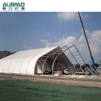 China Water proof 15m tenta tenta marquee 15m flame retardant curve roof Aluminum PVC arcum tent for sale