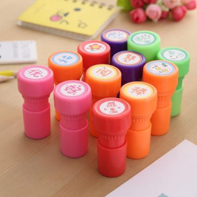 China Wholesale Office Cartoon Expression Seal Photosensitive Flash Stamp Reward Teacher Teacher Reviews Praise Seal Reward Gift Small for sale