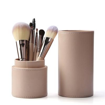 China Flat Brush 7 Pieces Makeup Brush Set Eyeshadow Eyebrow Foundation With PU Cylinder Leather Case Bag for sale