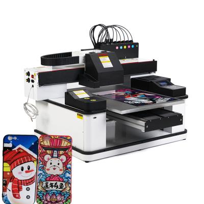 China China 3 Print Heads 6090 Large Format Mobile Phone Case Printing Machine Indoor Outdoor Favorable Prices A1 Digital UV Flatbed Printer For Sale for sale