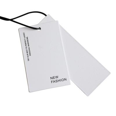 China Cheap Recycled White Cardboard Recyled Paper Hang Tags Custom Printed Label Tag For Garment for sale