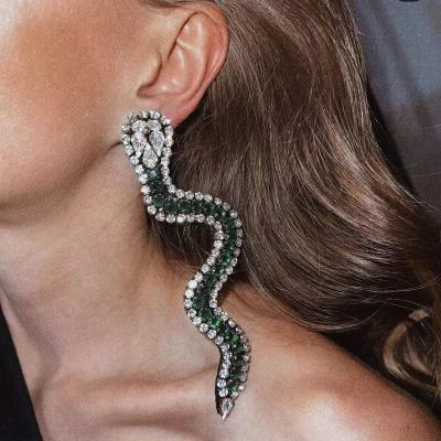 China 2022 Fashion Diamond Rhinestone Earrings Women's Creative American Alloy TRENDY High Quality Dinner Water Drop Snake Shiny Earrings for sale