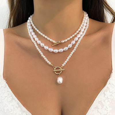 China TRENDY Fashion Quality Gold Plated OT Loop Water Drop Heart Shaped Pendant Stacked Three Layers Pearl Necklace Vintage Chain Clavicle for sale