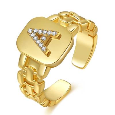 China Gold Letter Hip Hop Alphabet A to Z Strap Design Alloy Gold Plated Adjustable Rhinestones Sparkle Ring for sale