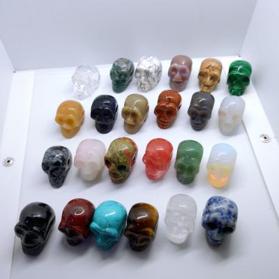 China Europe Bulk Natural Crystal Skulls Wholesale Carved Human Head Pocket Skulls Model For Healing for sale