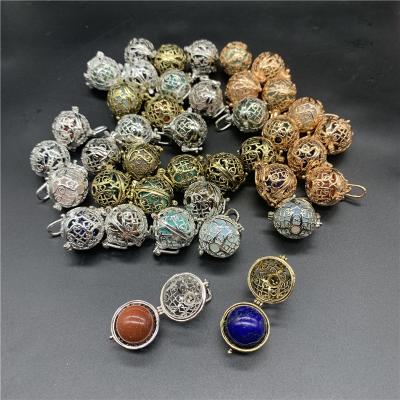 China Europe Perfume Pouch Metal Port Cages With 16mm Mini Size Crystal Spheres Inside Unique Pouch Crystal Therapy Stones Gifts for sale