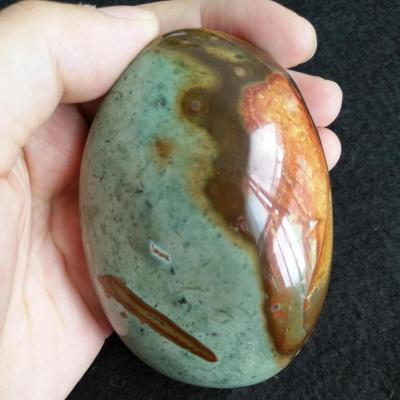 China Wholesale Natural Colorful Jasper Palm Stone Madagascar Ocean Healing Stone from Europe for Home Decoration for sale