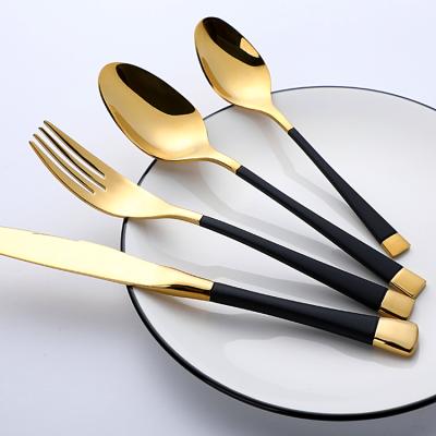 China Sustainable promotion gold and black cutipol flatware stainless steel cutlery 24pcs set for sale