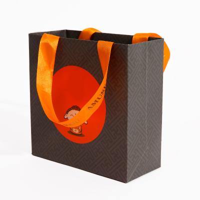 China Chocolate Recyclable Custom Holiday Logo Paper Bags Shopping Promotional Gift Paper Bag With Ribbon Handles for sale