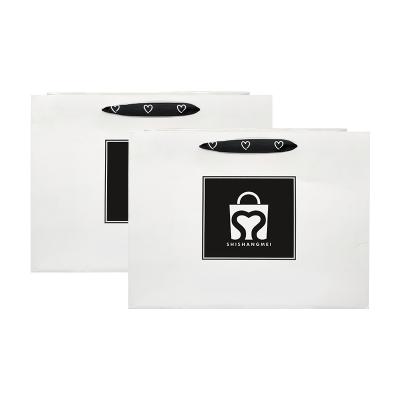 China Recyclable Recycled Eco Friendly Bags Paper White Bag Clothing Shopping Bags With Logo Satin Ribbon Handles Custom Made for sale