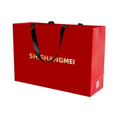 China Custom Logo Recyclable Red Retail Packaging Gift Paper Bags With Ribbon Handles Cosmetic Matte Boutique Shopping Paper Bags for sale