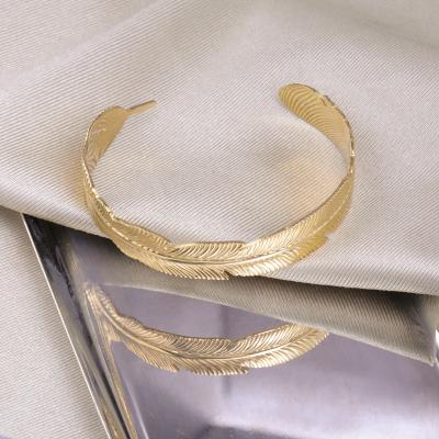 China Latest Design TRENDY 14k stainles solid gold steel charms for feather bracelets for sale