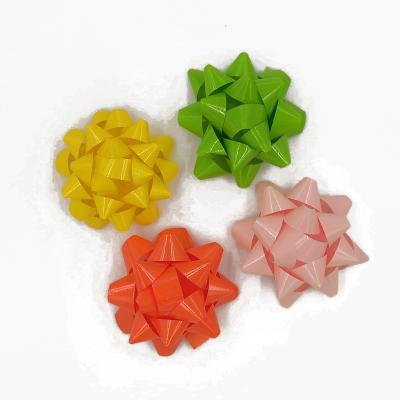 China With Plastic Star Plastic Bow Competitive Price Christmas Colors Ribbon Gift Wrapping Star Ribbon Plastic Bows for sale