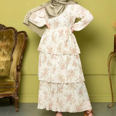 China Islamic Clothing Flower Print Chiffon Long Sleeve Muslim Dress With Full Striped Muslim Women Ruffle Cake Lining Dress for sale