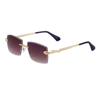 China Fashion Sunglasses Woman Summer Fashion Metal Sunglasses Rimless Round Sun Glasses for sale