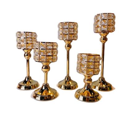 China Cafes Home Office Hotel Centerpieces Metal Iron Gold Crystal Candle Holder For Home Table Decor for sale