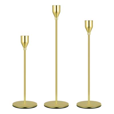 China Morden Gold Wholesale Luxury Nordic Brass Candlesticks Taper Metal Candle Holders Set Of 3 For Wedding Decorative for sale