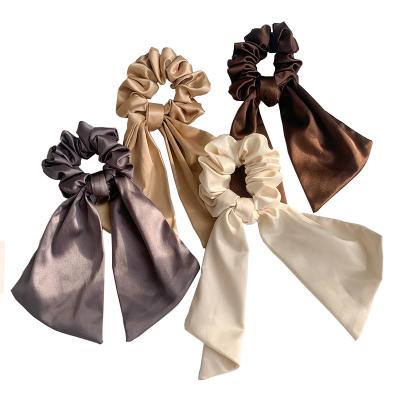 China Eco-friendly/BPA Free Silk Elastic Hair Band Ring Knotted Scrunchies Women Ponytail Bow Flames Hair Tie Solid Color Elastic Hair Bands For Women for sale