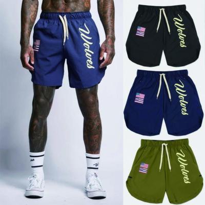 China Summer Custom Anti-wrinkle Loose Training Male Sports Running Shorts Basket Ball Polyester Quick Dry Shorts For Men for sale