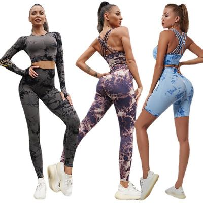 China Seamless Custom 4 Pieces Outfits Tie Dye Workout Clothes For Women Gym Wear Sports Bra Scrunch Shorts Yoga Leggings Manufacturer for sale