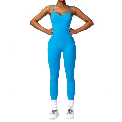 China Seamless Custom Ropa Deportiva Mujer Cross Back Yoga Jumpsuit One Piece Sports Bodybuilding Backless Bodysuit for sale