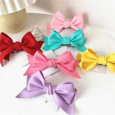 China New European and American style cute colorful solid 3D cotton hair bow with clips for kids girls hair accessories for sale