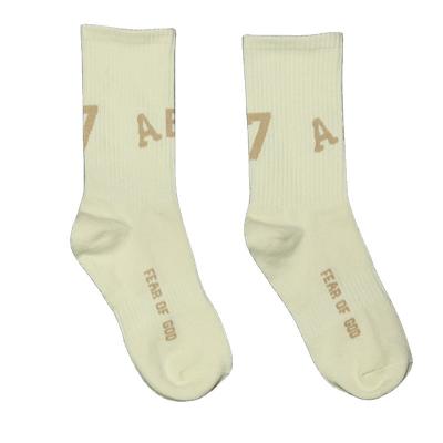 China Autumn printed breathable sweat-absorbent non-slip socks QUICK DRY English number 7 cotton sports socks for men women for sale