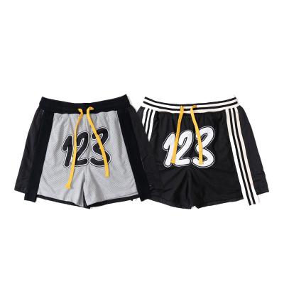 China Summer Basketball Drawstring Mesh Sports Breathable Digital Embroidered Shorts Men's Loose Casual Pants for sale