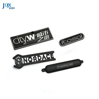 China Sustainable Clothing Metal Letter Tags Custom Sew Customized Metal Clothing Garment Label Tags Metal Clothing Tags For Garment for sale