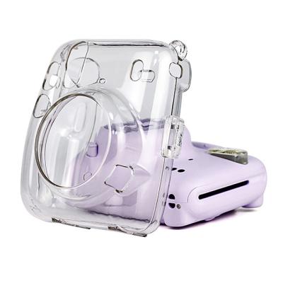 China Portable Reliable Protective Snare Case For Fujifilm Instax Mini 11 Camera Clear Crystal Case With Adjustable Rainbow Strap for sale