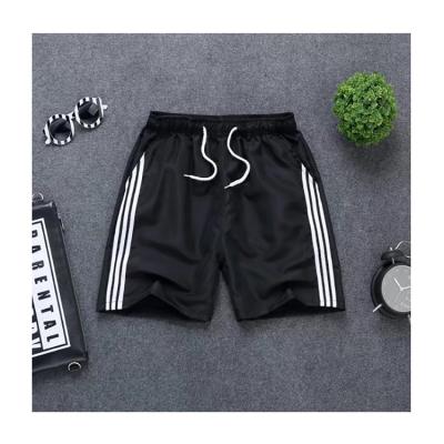 China QUICK DRY shorts mens summer casual five point pants sports beach pants for sale