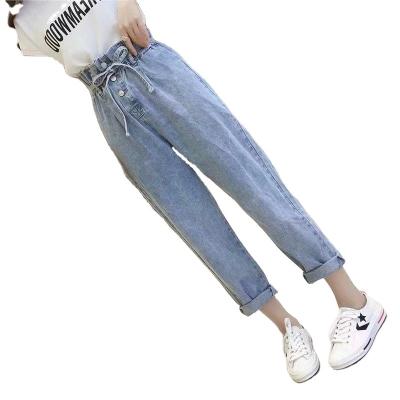 China Breathable Skinny Elastic Band Drawstring Mid Rise Jeans Ladies Elastic Ripped Hip-lifting Pants for sale