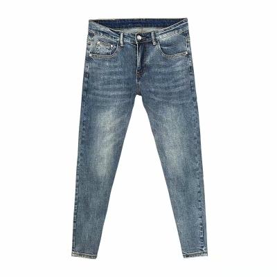 China Breathable Factory Direct Selling Mens Jeans Trend New Blue Washed Slim Nine Stitch Mens Jeans Pants for sale