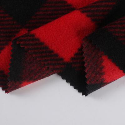 China Waterproof High Quality Medium Weight Waterproof  Windproof 100 Polyester  Knitted Plaid Printed Polar Fleece Fabric for sale