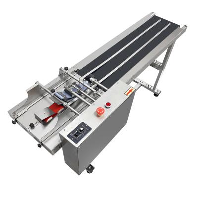 China Apparel Faith High Speed ​​Packaging Equipment Mask Friction Feeder Cardboard Automatic Feeder Paging Machine for sale