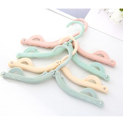 China Traditional Plastic Bikini Hangers Folding Portable Hanging Retractable Swimsuit Clothes Lingerie Hanger Swimming Accessories for sale