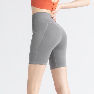 China Fashion Anti-Static Quick Dry Spandex Factory Sales Promotion Cycling Biker Sports Pocket Shorts Breathable Woman Gym Yoga Plus Size Shorts for sale