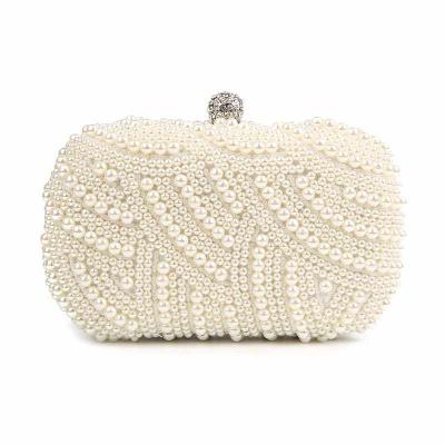 China Luxury Handmade Evening Clutch Bag Pearl Clutch Bags Women Pinch Diamond Chain White Evening Bags For Party Wedding for sale