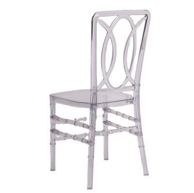 China New Modern Plastic Resin PC Clear Cross Back Chair For Banquet Dining Hall for sale