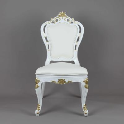 China Resin Modern Stackable Rental Royal Banquet White Chairs With Decorative Gold Design for sale