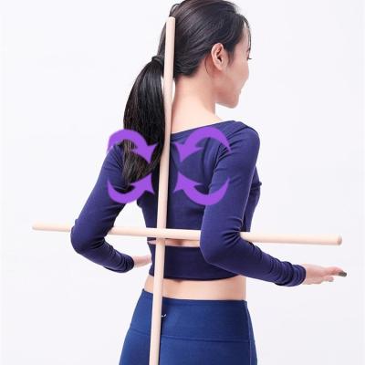 China Durable Use Back Dance Pilates Correct Chest Expander Round Wooden Pole Yoga Stick for sale