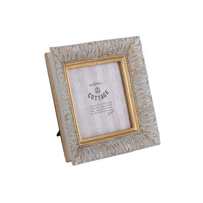 China Modern European Baroque Wedding Family Decoration Vintage Gold Resin Square Durable Antique Picture Frame for sale