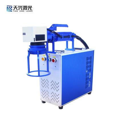 China Small air-cooled handheld laser marking machine portable small code stall code with metal stainless steel laser engraving machine fiber laser marking for sale