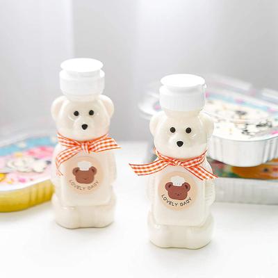 China 2022 New Arrival Disposable Eco-Friendly Custom Shape LOKYO Cute Bear Drinks Mug Cups Juice Transparent Plastic Cups With Logo for sale