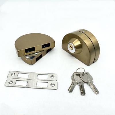 China Double Side Iron Stainless Door Lock Frame Glass Material Door Lock for sale