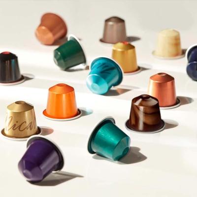 China Custom Small Coffee Tea Nespresso Shape Empty Aluminum Foil Coffee Capsule With Lid for sale