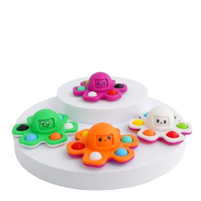 China O167 Silicone Push Bubble Moving Person Sensory Toys Rotating Toy Stress Relief Face Change Octopus Moving Person Spinner for sale