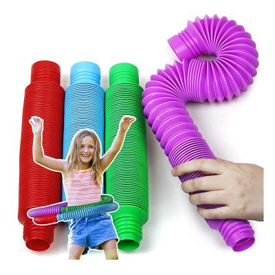 China DDA2465 Plastic Kids Toy Fidgets Pipe Autism Sensory Plastic Tubes Stretch Relaxation Wiggle Adult Colorful Tubes for sale