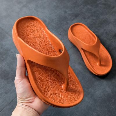 China CUSHIONING new 2021 summer ladies wear EVA thick-soled non-slip, anti-odor flip-flops, men's hollow-out slippers for sale