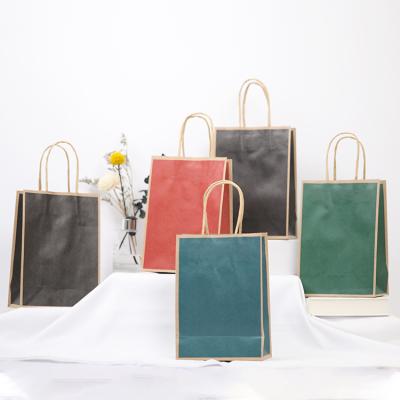 China Color Fashion Biodegradable Custom Kraft Paper Bags With Handles for sale